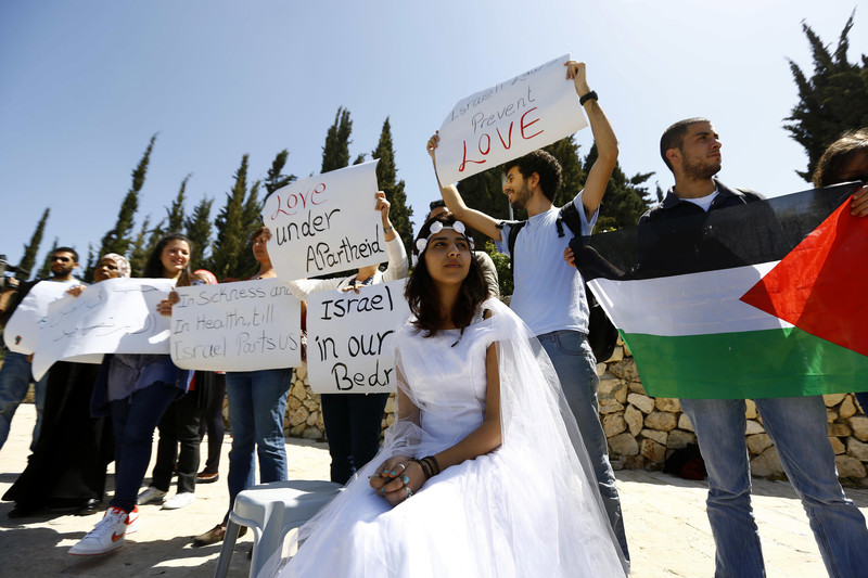 Una protesta contro la legge che impedisce i ricongiungimenti familiari tra palestinesi dei Territori e cittadini israeliani 